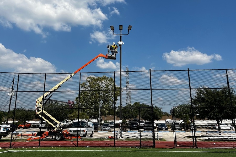 mobile security camera from Wolf Security Cameras installed next to a sports field