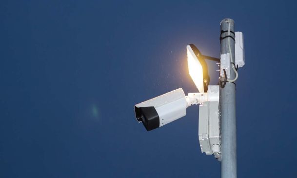 Surveillance system with deterrence lighting